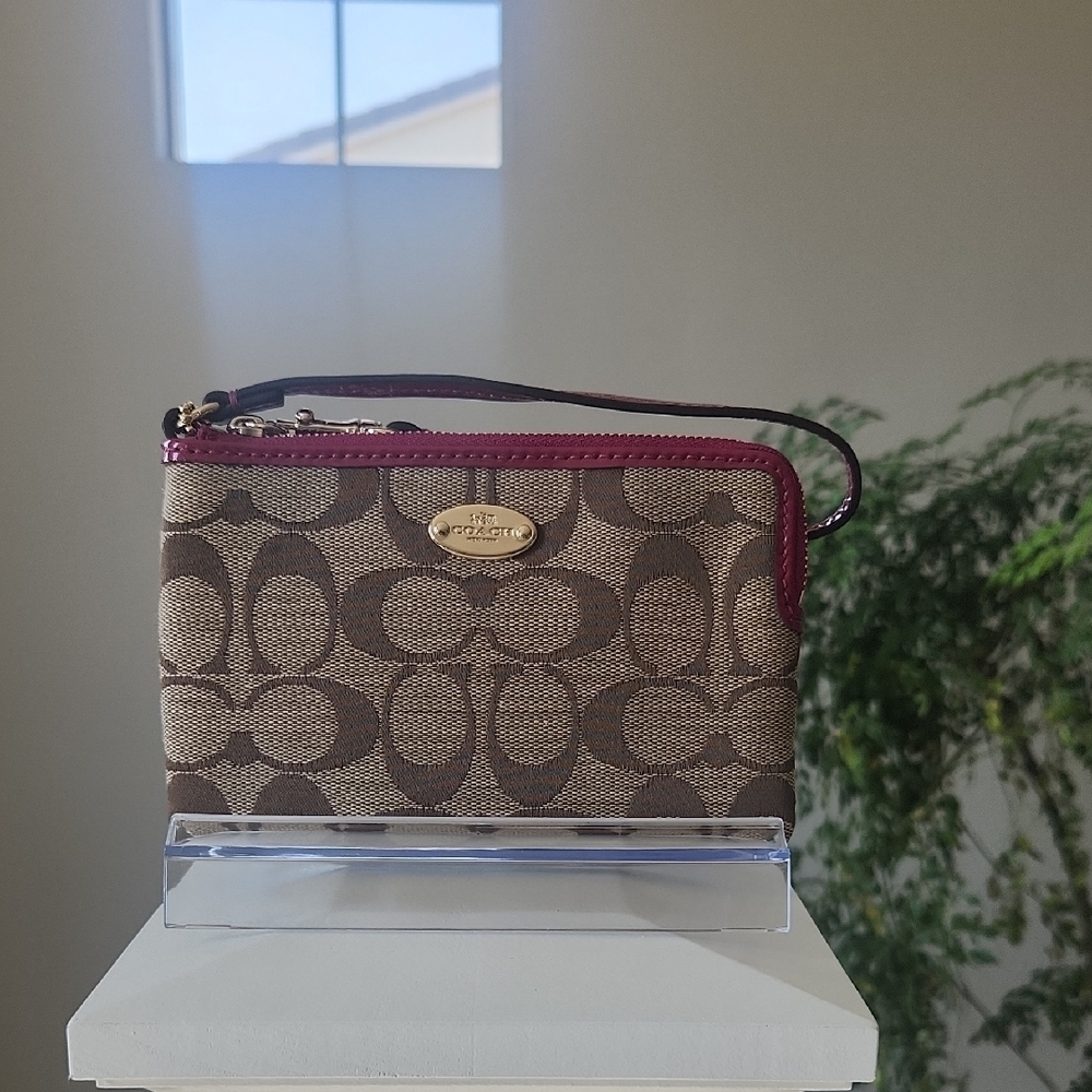 Coach Corner Zip Wristlet In Signature Canvas Khaki And Hot Pink